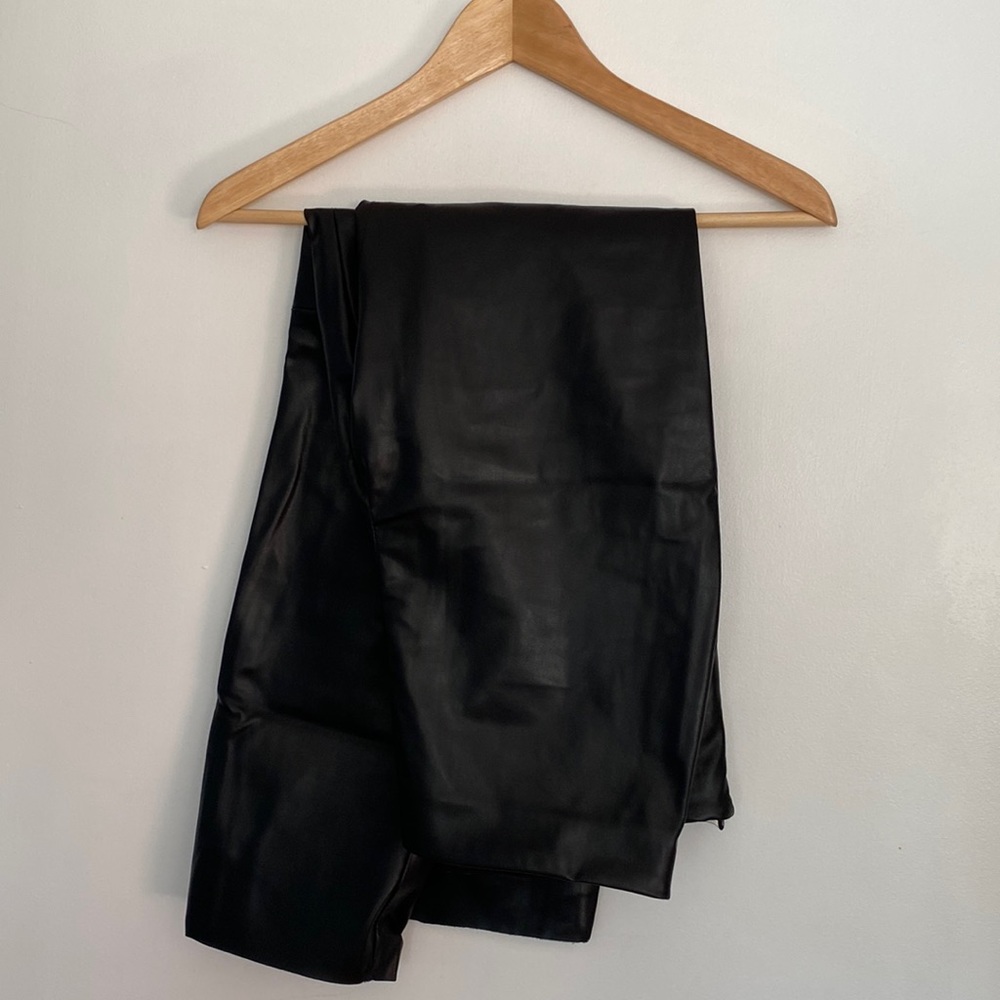 H&M Black leather pants. Cropped at the ankle (depending on height)